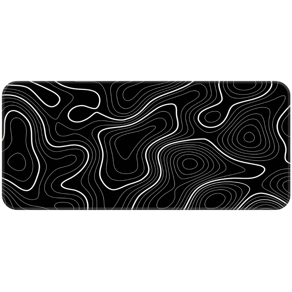Black and white topographic desk mat on developer desk setup with mechanical keyboard.